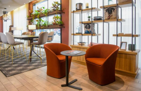 Отель Aparthotel Adagio Muenchen City  Мюнхен